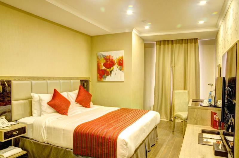 Hotel Ramada By Wyndham Bishkek Centre Extérieur photo