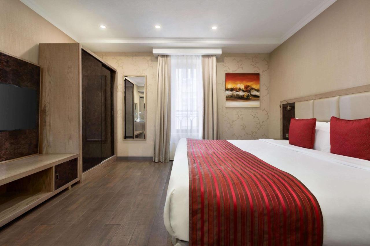 Hotel Ramada By Wyndham Bishkek Centre Extérieur photo